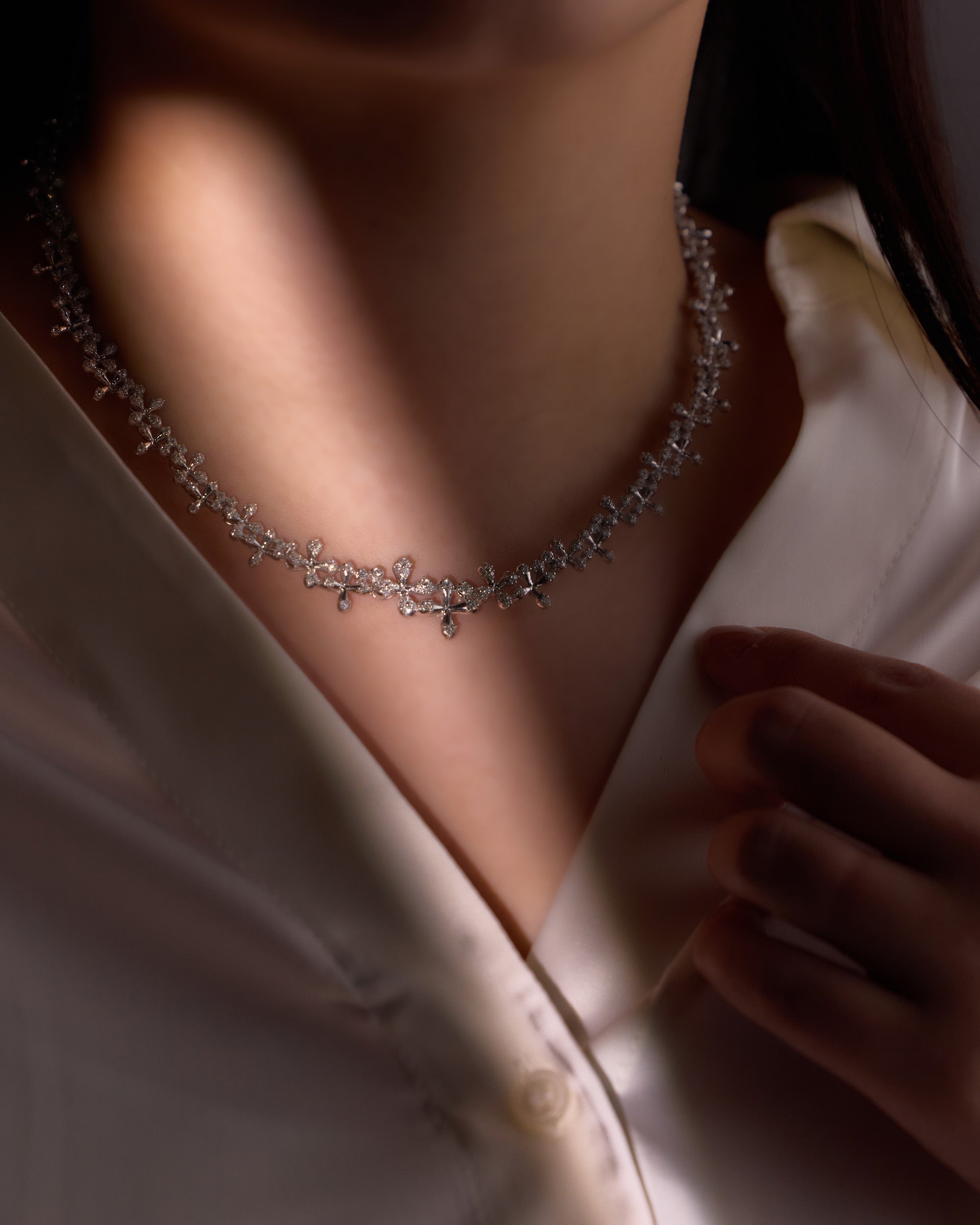 Wildflowers Diamond Collar in 18k white gold with 3.00ct natural diamonds and floral motifs on model