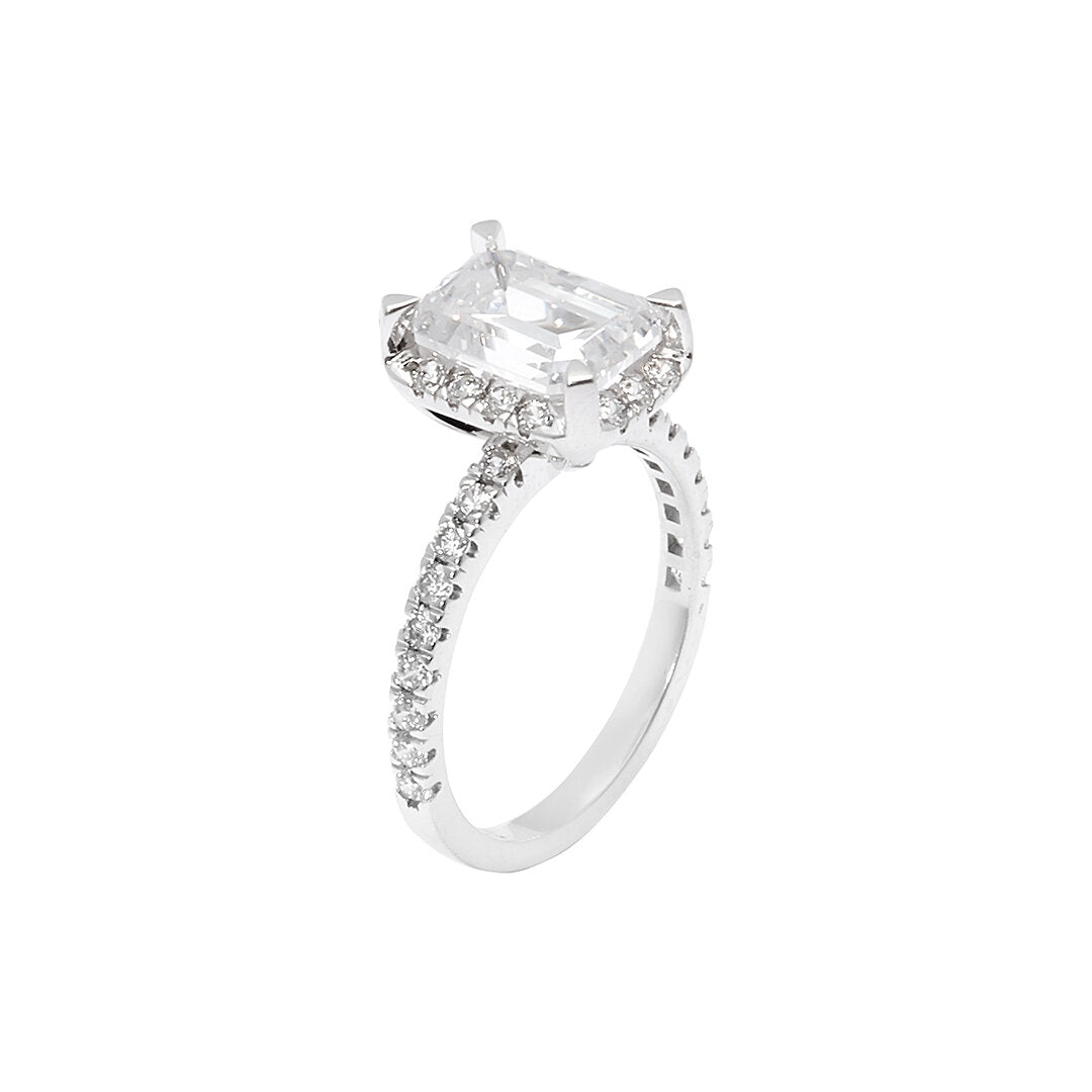 Faith Jewels Sophie diamond engagement ring featuring an elongated central diamond surrounded by a delicate diamond halo, set on a fine diamond-encrusted band