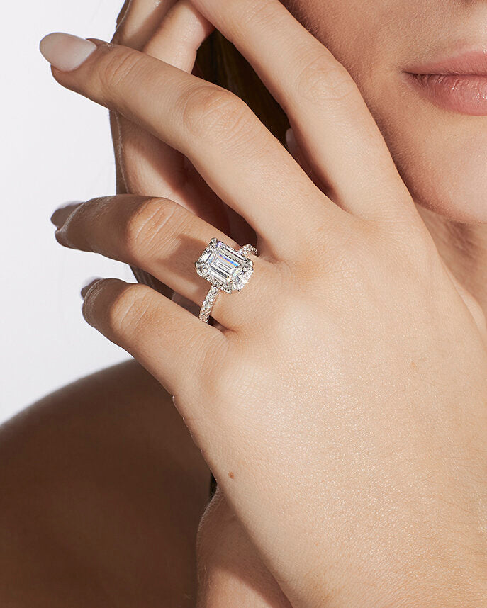 Faith Jewels Sophie diamond engagement ring featuring an elongated central diamond surrounded by a delicate diamond halo, set on a fine diamond-encrusted band