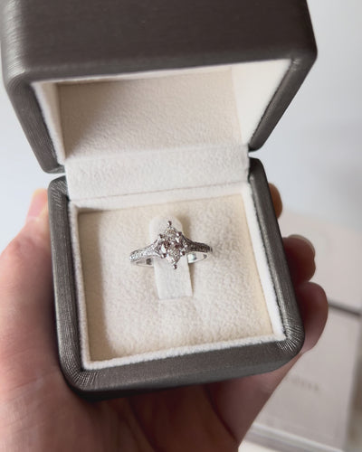 Elegant Marquise Split Band Diamond Ring in white gold, featuring centre marquise diamond and sparkling shoulder accents.