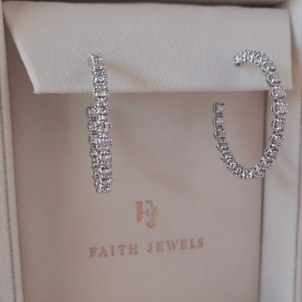 Faith Jewels Elegant diamond hoop earrings with diamonds set inside the hoop for maximum sparkle, enhanced by an illusion setting